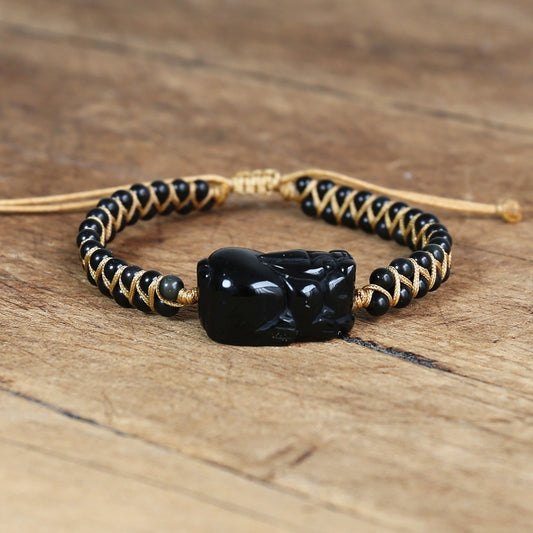 Hand Woven Hand Carved Hungry Dragon Bracelet