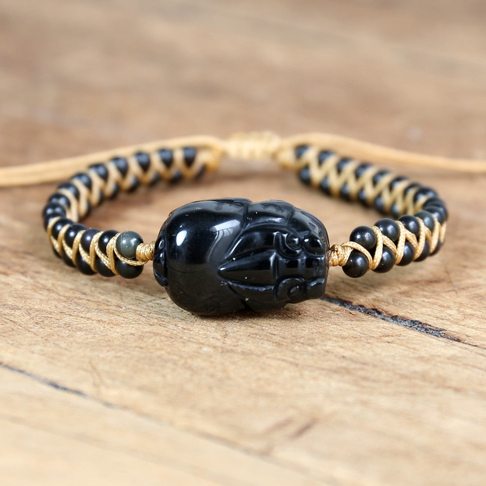 Hand Woven Hand Carved Hungry Dragon Bracelet